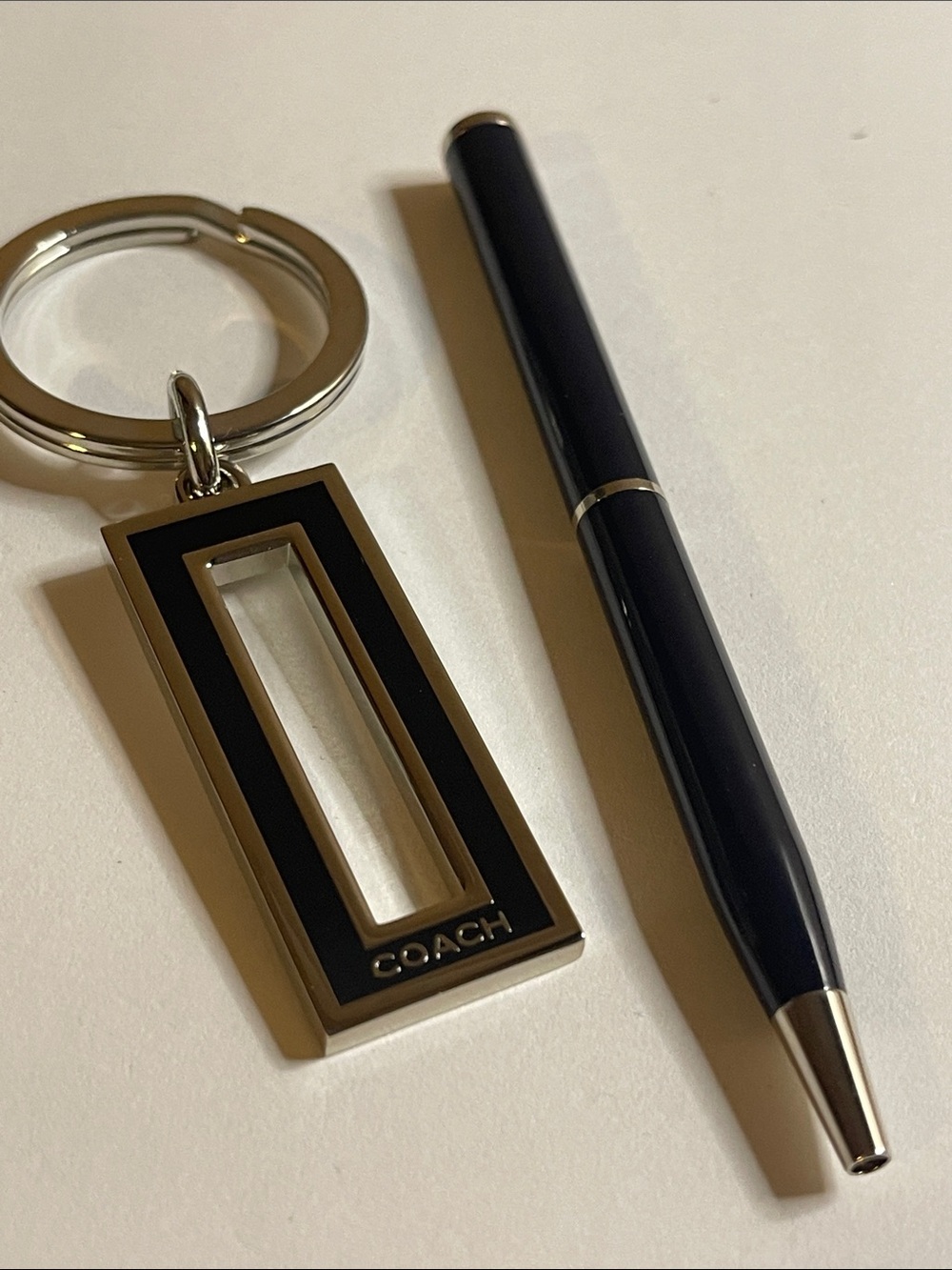 Coach Black and Silver Rectangular Keychain and Coach Pen